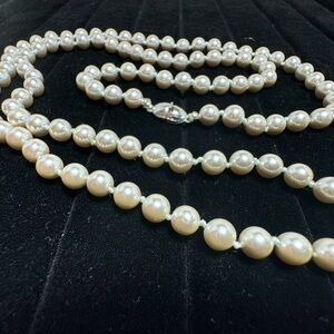 Vintage Signed Long Monet faux pearl necklace. High quality excellent condition.